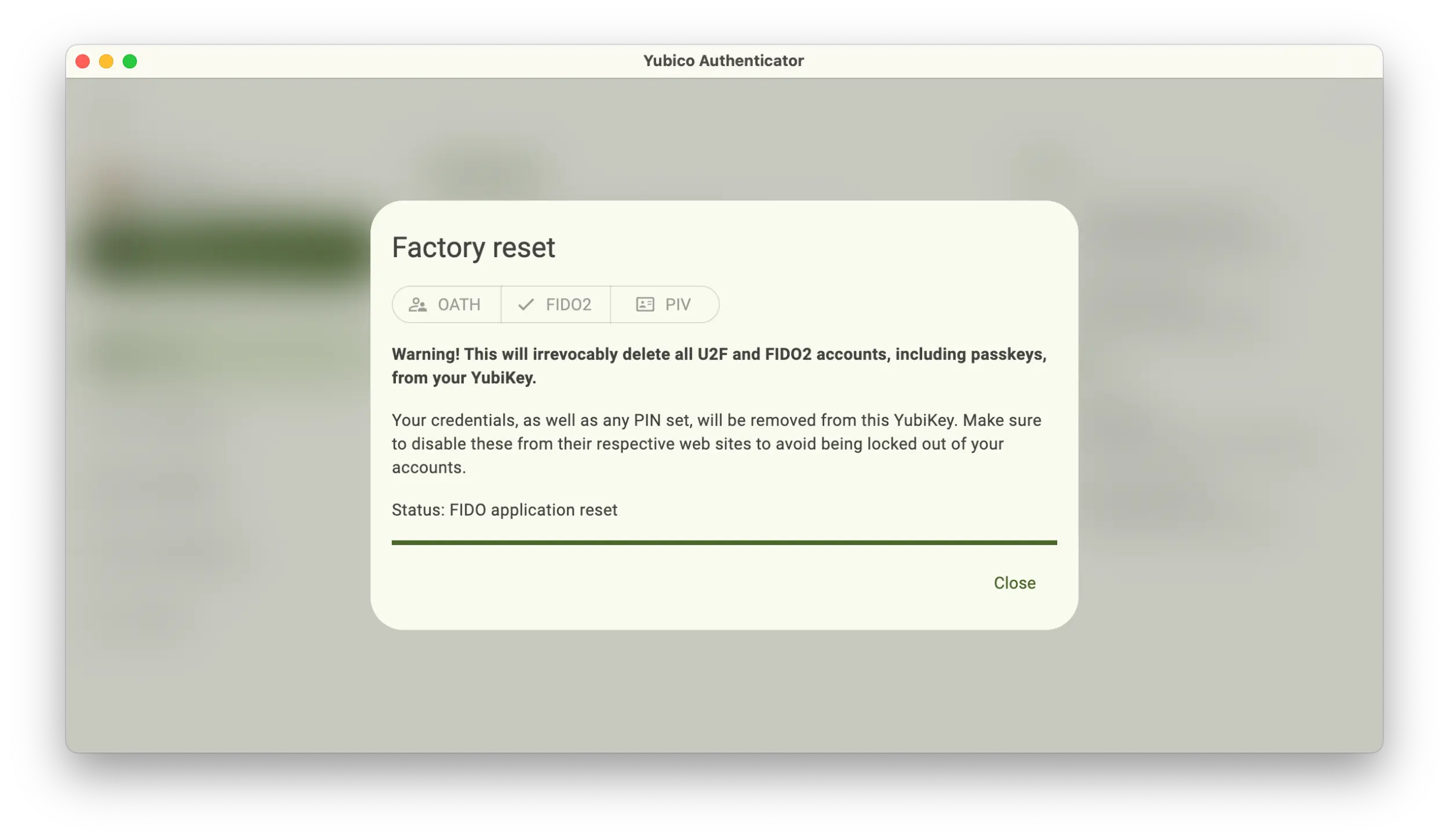 Screenshot of the Yubico Authenticator application showing Factory reset popup with a warning before reset.