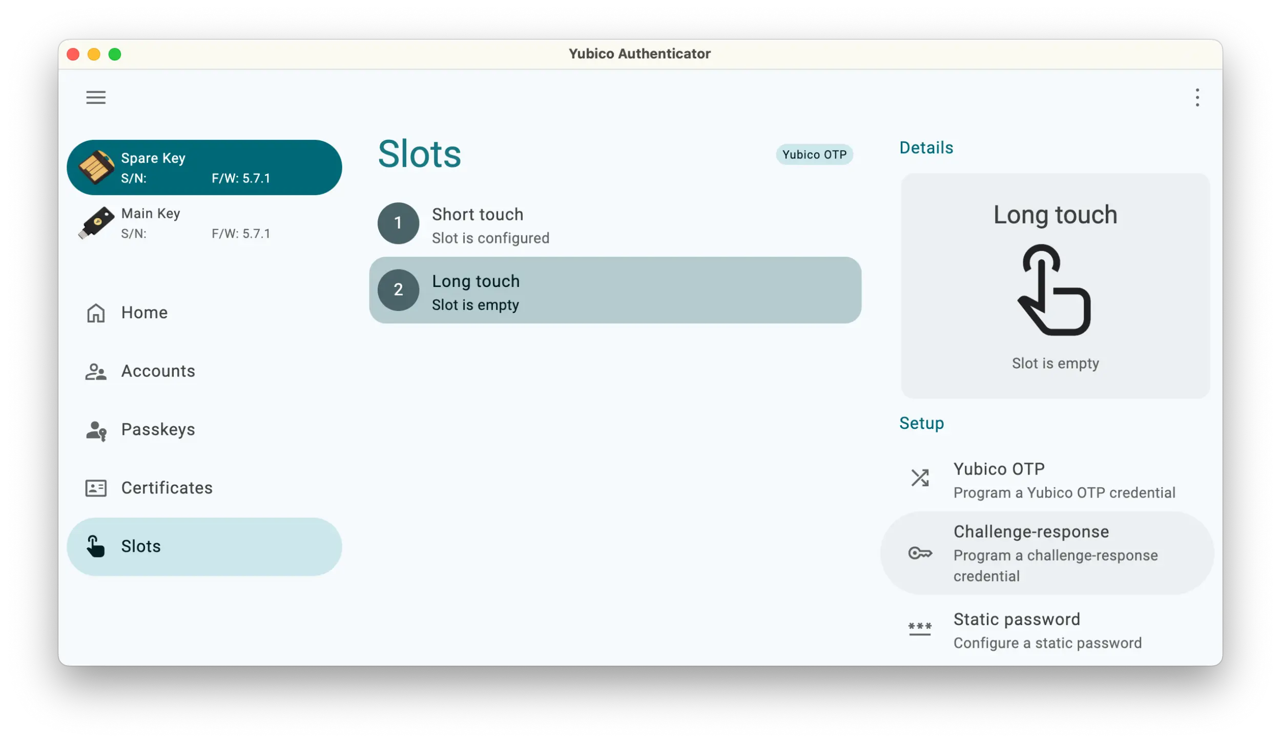 Screenshot of the Yubico Authenticator application showing the Slots section with the spare key selected. The Long touch is labeled empty.