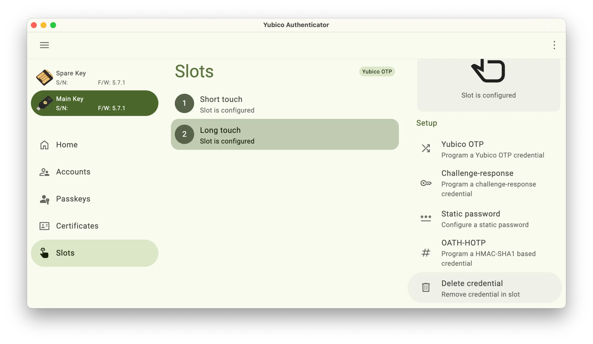 Screenshot of the Yubico Authenticator application showing the Slots section with the Long touch selected and the Delete credential button selected on the right.