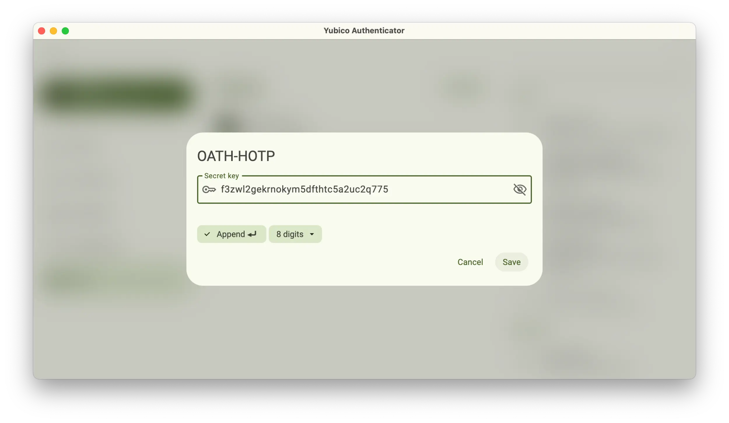 Screenshot of the Yubico Authenticator application showing an OATH-HOTP popup with a Secret key field filled.