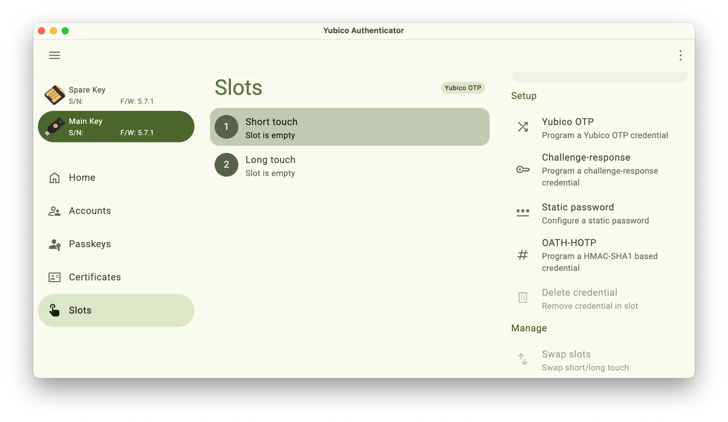 Screenshot of the Yubico Authenticator application showing the Slots section with the two slots labeled empty.